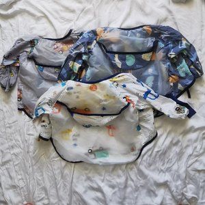 Three Long Sleeved Cloth/Plastic Bibs
